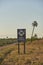 Signage with the drawing of a capybara and the text Slow down. Wildlife crossing