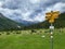 Signage of hiking direction in Stabelchod trail in Swiss National Park.