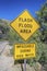 Signage warning at a flash flood area along a hiking trail in Sabino Canyon