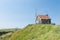 Signal house on top of dune