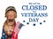 Signboard. We will be closed for Veterans Day