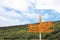 Signpost in Bluff showing towards other cities of the world