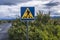 Signpost `Divers Crossing` at Silfra divergent tectonic drift in Thingvellir, Sudurland, Iceland