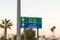 A signpost in English and Arabic towards Jerusalem and Beit Jala stands on the street in Bethlehem in Palestine