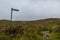 Signpost for hikers in Glen Coe, Scotland, Great Britain