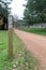 Signpost indicating a shared footpath and keep dogs on lead on a walking track