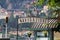 Signpost for a landing stage at lake Como, Italy