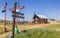 Signpost and little cottage on Texel island