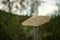 Signpost made of piece of sandstone on a pole