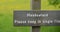Signpost in meadow in Upper Swaledale in Yorkshire Dales