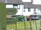 A signpost in Sampford Peverell, Devon, directing towards the pubs and toilets