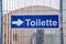 The signpost toilet on blurred background