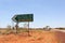 Signpost of an unsealed road to Alice Springs, Australia