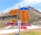 Signpost written in German tells various hiking trails, Zermatt, Switzerland. Blumenweg is blumen trail, murmelweg is marmot trail