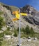 Signpost written in German of various hiking trails, Zermatt, Switzerland. weg means trail, furi is cable car, garten is garden, g
