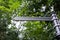 A signposts directs visitors to the old mill and waterfall in Jesmond Dene, Newcastle upon Tyne, UK