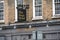 Signs above lap dancing club entrance on Whitechapel Road, Whitechapel, London