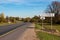 Signs at the entrance to the village of Bukhlovka on highway A130. Photo video recording in progress