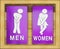 Signs female and male bathroom on wooden background.