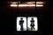Signs night bathroom, old toilet symbol male and female in the night background