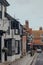 Signs outside Union restaurant, Davies and Seeley dentist and Castle Museum on East Street in Rye, UK