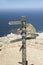 Signs point with mileage totals to Beijing, Jerusalem, New York, South Pole, Paris, Rio De Janeiro at Cape Point, Cape of Good Hop