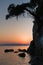 Sihouette of a rocks at sunset, Kastani Mamma Mia beach, island of Skopelos