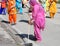 Sikh religion women during the ceremony while sweeping the road