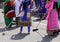 Sikh women while scavenging the street with a broom during a cer