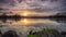 Silence On The Lake At Sunset - Stone And Gras In Foreground