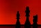 Silhouette of 3 chess pieces