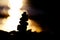 Silhouette above sea Stone stupa at the sea coast