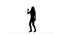 Silhouette of a active woman dancing