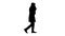 Silhouette Adult man wears protective medical mask talking on the phone and walking.