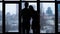 Silhouette of affectionate couple embracing