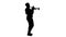 Silhouette African american musician playing the trumpet expressively.