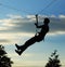 Silhouette of alpinist hang on rope