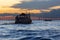 Silhouette of Amazon wooden boat on Rio Negro in Manaus, Brazil