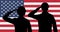 Silhouette american soldiers salute on usa flag