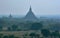 Silhouette of Ananda Temple in morning mist. Bagan, Myanmar