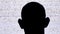 Silhouette of an Anonymous Man`s Head is Watching White Static Noise and TV Interference