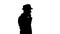 Silhouette Arabic man in casual walking and making a phone call.