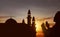 Silhouette of asian muslim praying with prayer beads