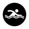 Silhouette of athlete practicing swimming