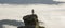 Silhouette of athletic climber tourist on high rocky formation o