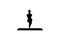 Silhouette Attractive girl standing in the balancing yoga pose Garudasana. Young woman in the Eagle yoga pose.