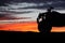 Silhouette ATV or Quad bike in the sunset. Holiday exploration concept