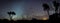 Silhouette of Australian outback panorama in front of milky way and zodiacal light