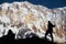 Silhouette backpacker on the rock and Annapurna I Background 8,091m from Annapurna Basecamp ,Nepal.