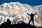 Silhouette backpacker on the rock and Annapurna I Background 8,091m from Annapurna Basecamp ,Nepal.